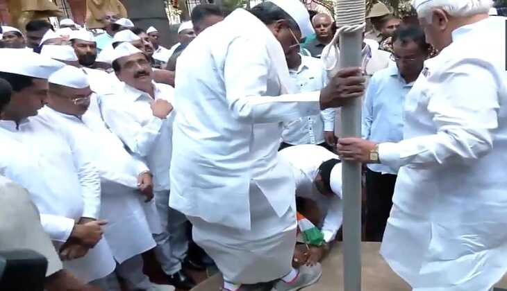 Karnataka CM Siddaramaiah in Hot Water: Shoes Removed by Congress Worker Holding National Flag Sparks Political Firestorm!