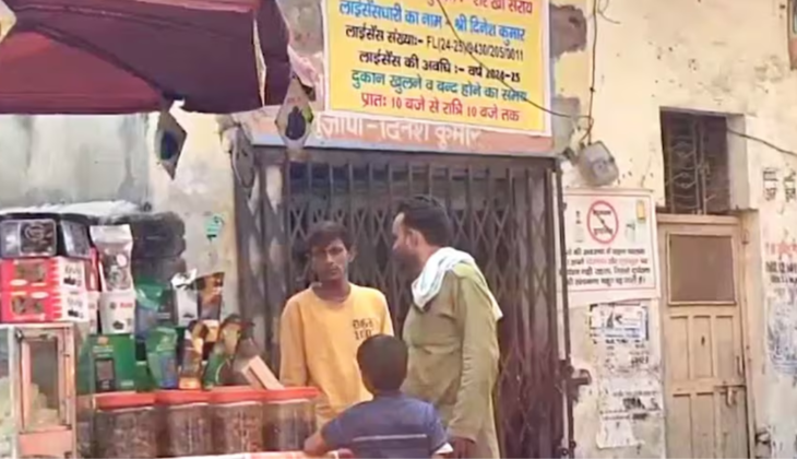 District Magistrate buying liquor