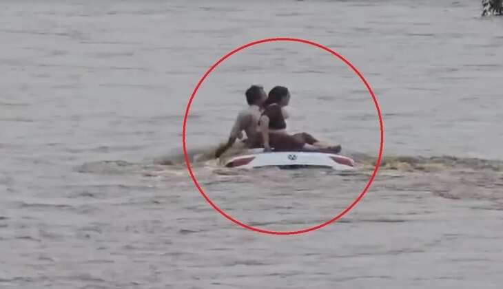 Sabarkantha Couple Stranded on Car Roof in Floodwater